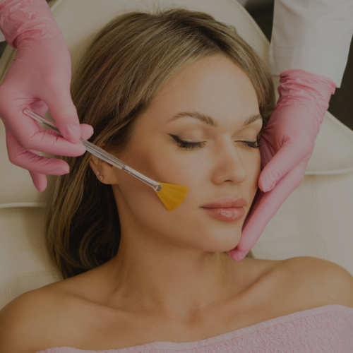 Zen Luxe Med Spa Aesthetic Services with Injector Resha A woman getting a facial treatment at a beauty salon.