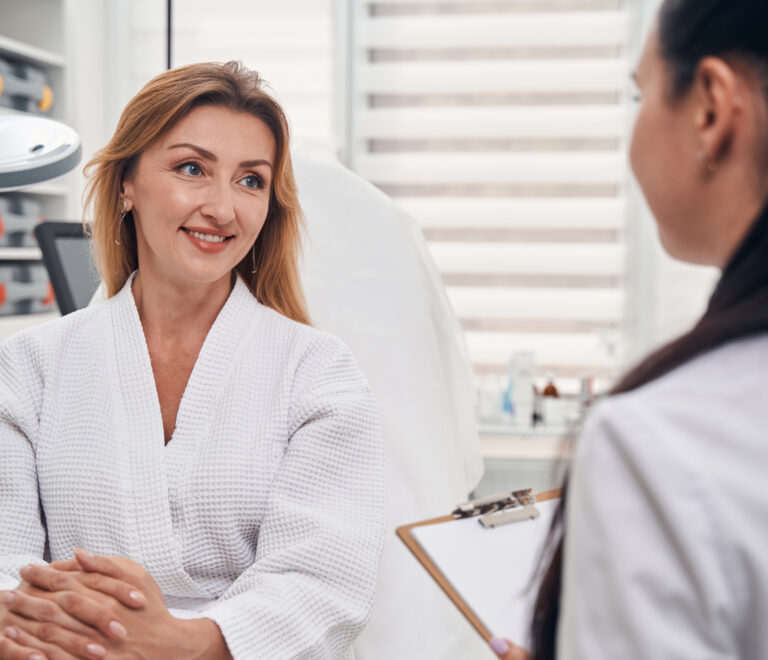 woman having a consultation at zen luxe medspa and iv lounge in coral springs, fl Contact us today